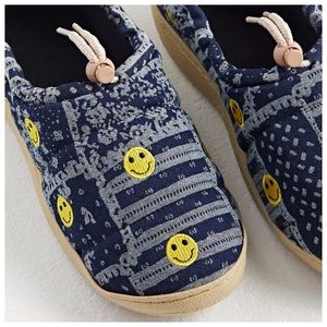 Urban Outfitters patchwork hard-sole slippers with happy face